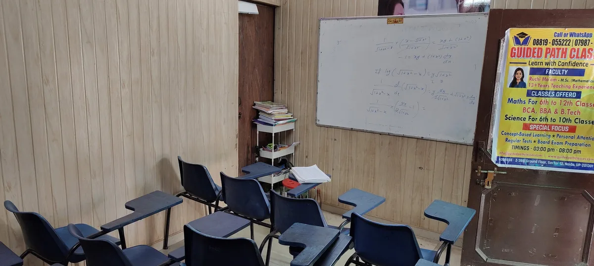 The Guided Path Classes classroom with the whiteboard and desks